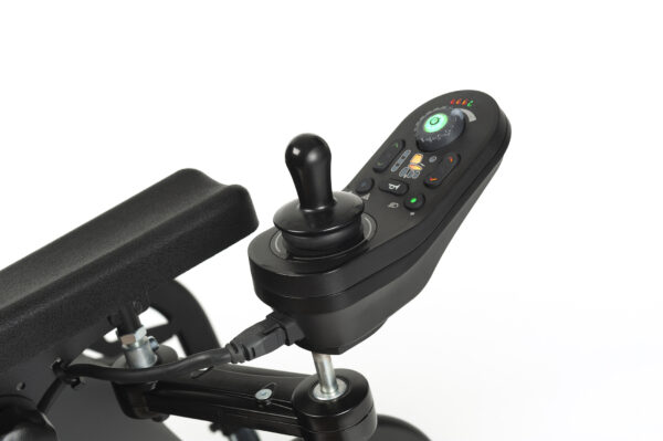 Joystick do wózka inwalidzkiego z różnymi przyciskami sterującymi.